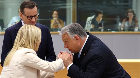 Angered over EU migrant rules, Poland and Hungary veto a summit statement in a gesture of protest